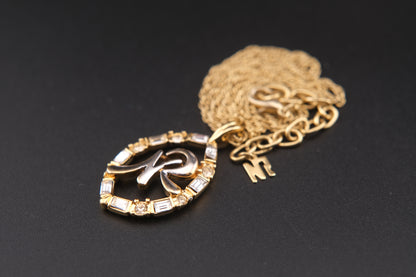 Vintage Nina Ricci Two-Tone Monogram Pendant Necklace with Rhinestones (1980s)
