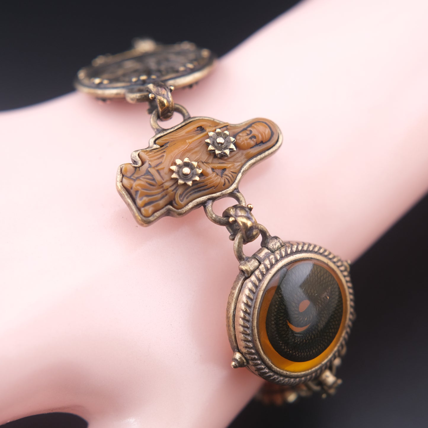 Vintage Multi-Charm Bracelet with Religious and Symbolic Motifs – Snake Locket