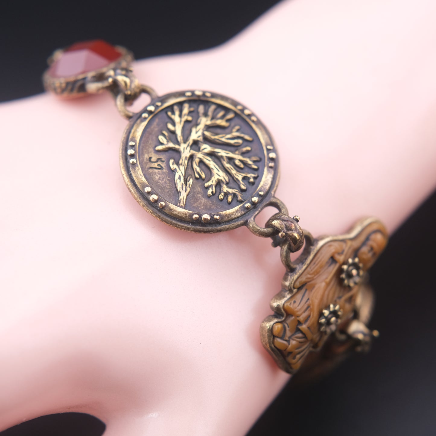 Vintage Multi-Charm Bracelet with Religious and Symbolic Motifs – Snake Locket