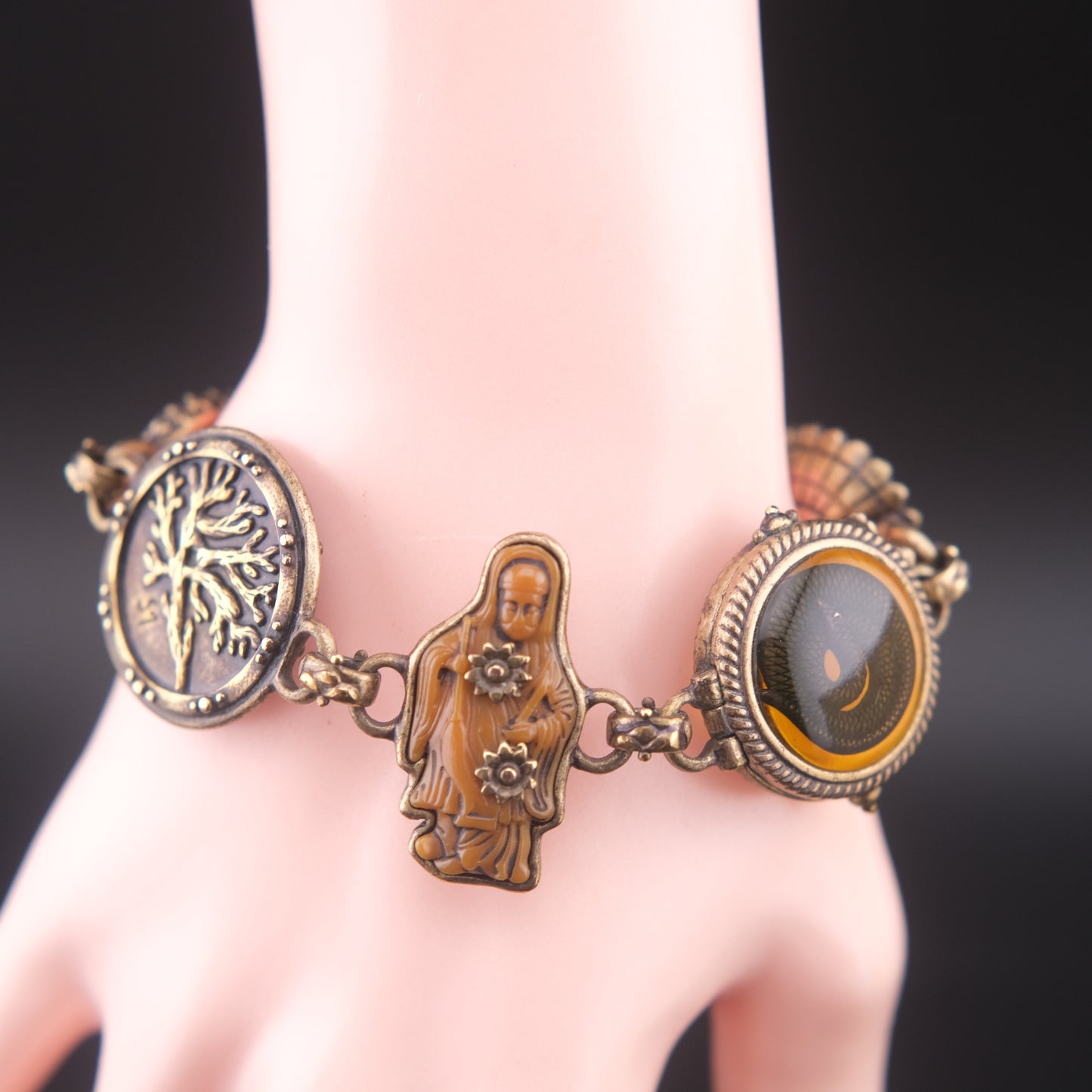 Vintage Multi-Charm Bracelet with Religious and Symbolic Motifs – Snake Locket