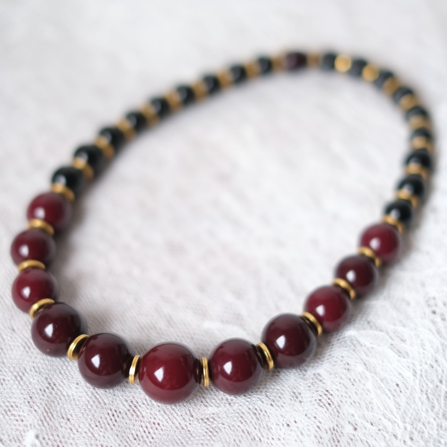 Vintage Yves Saint Laurent Bead Necklace – Black & Deep Red Resin Beads with Gold Accents, 14"