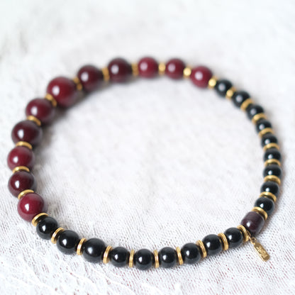 Vintage Yves Saint Laurent Bead Necklace – Black & Deep Red Resin Beads with Gold Accents, 14"