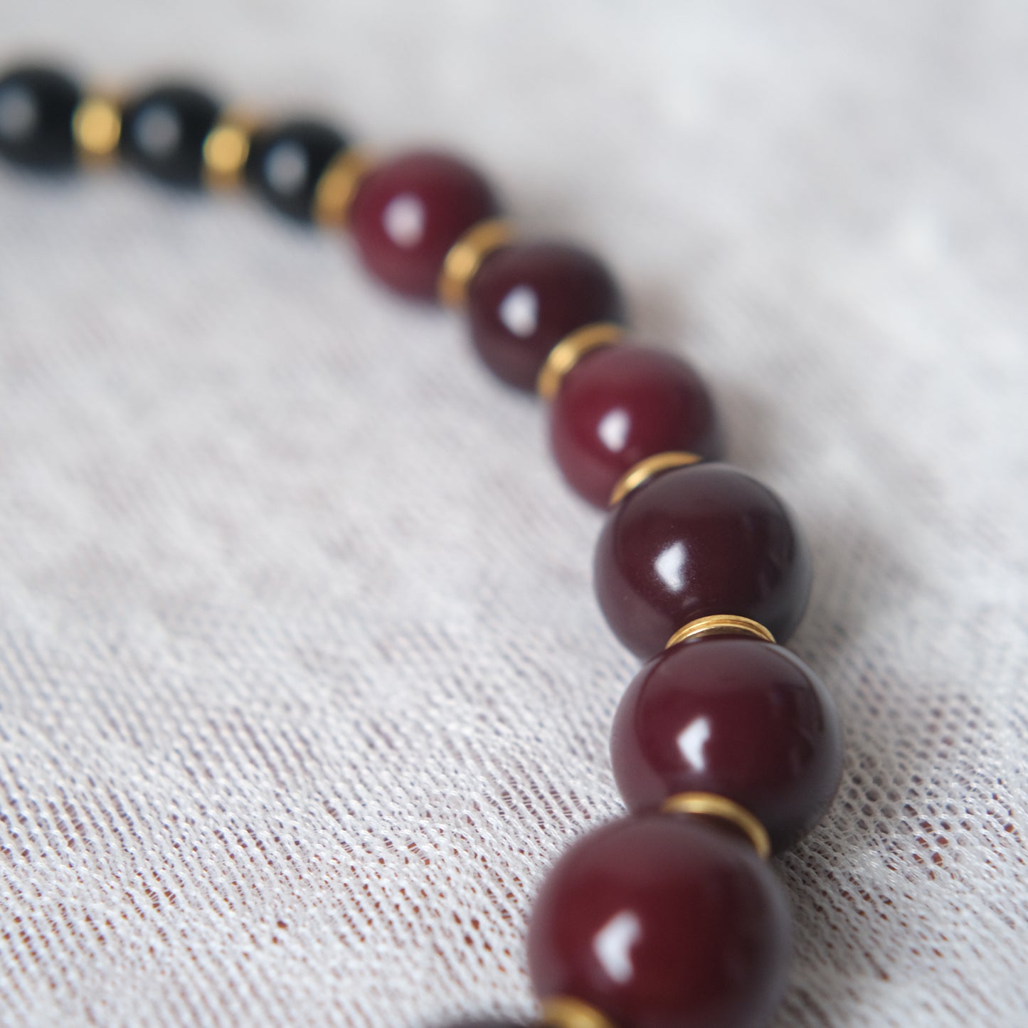 Vintage Yves Saint Laurent Bead Necklace – Black & Deep Red Resin Beads with Gold Accents, 14"