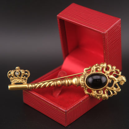 Vintage Gold-Tone Key Brooch with Black Cabochon and Crown Detail