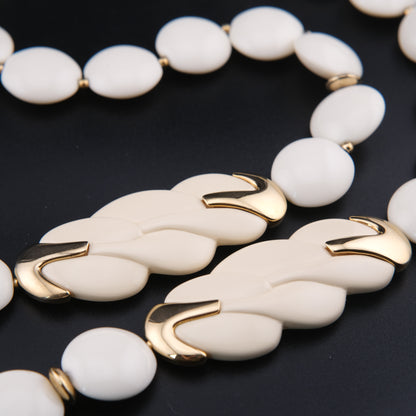 Vintage Trifari White Lucite Station Necklace with Sculptural Gold-Tone Accents