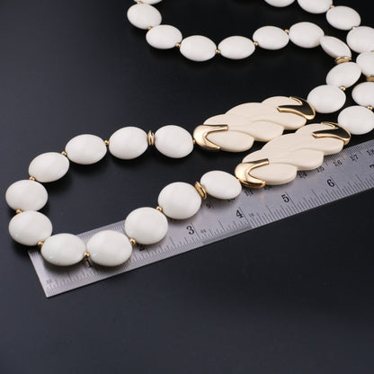 Vintage Trifari White Lucite Station Necklace with Sculptural Gold-Tone Accents