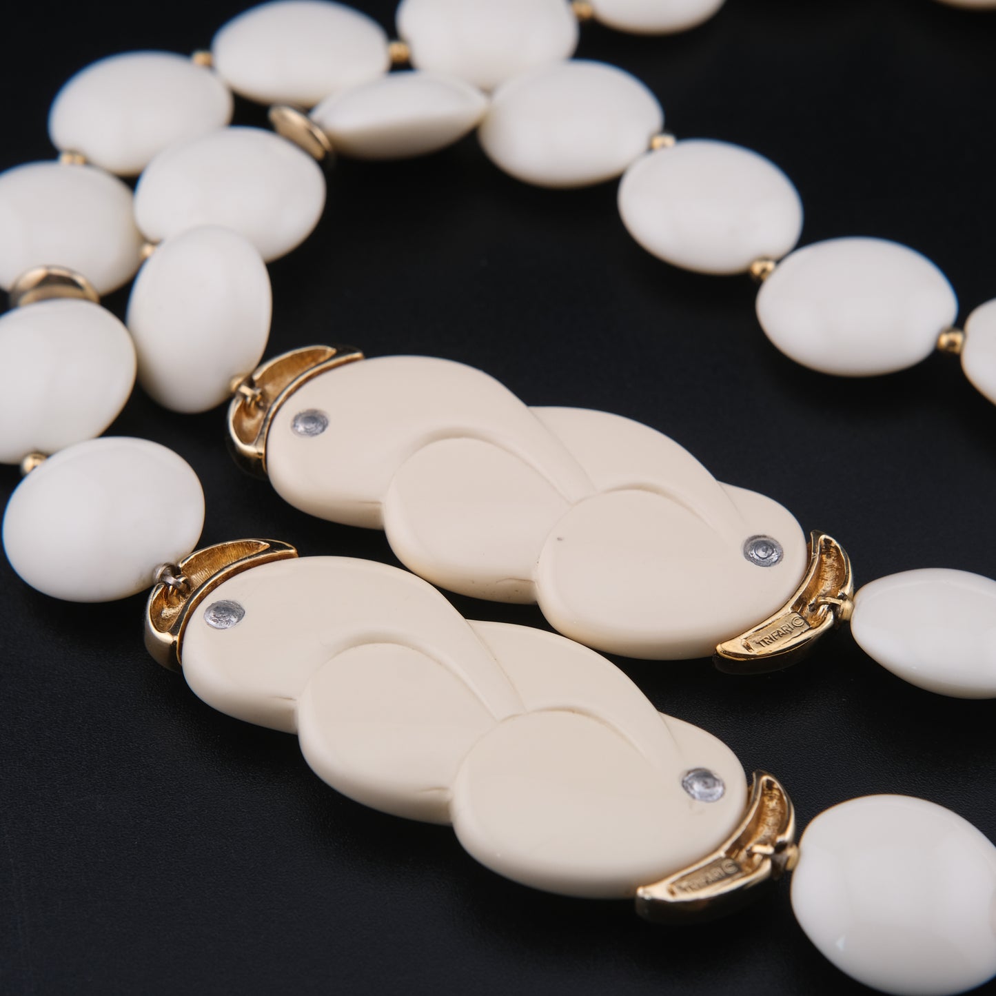 Vintage Trifari White Lucite Station Necklace with Sculptural Gold-Tone Accents