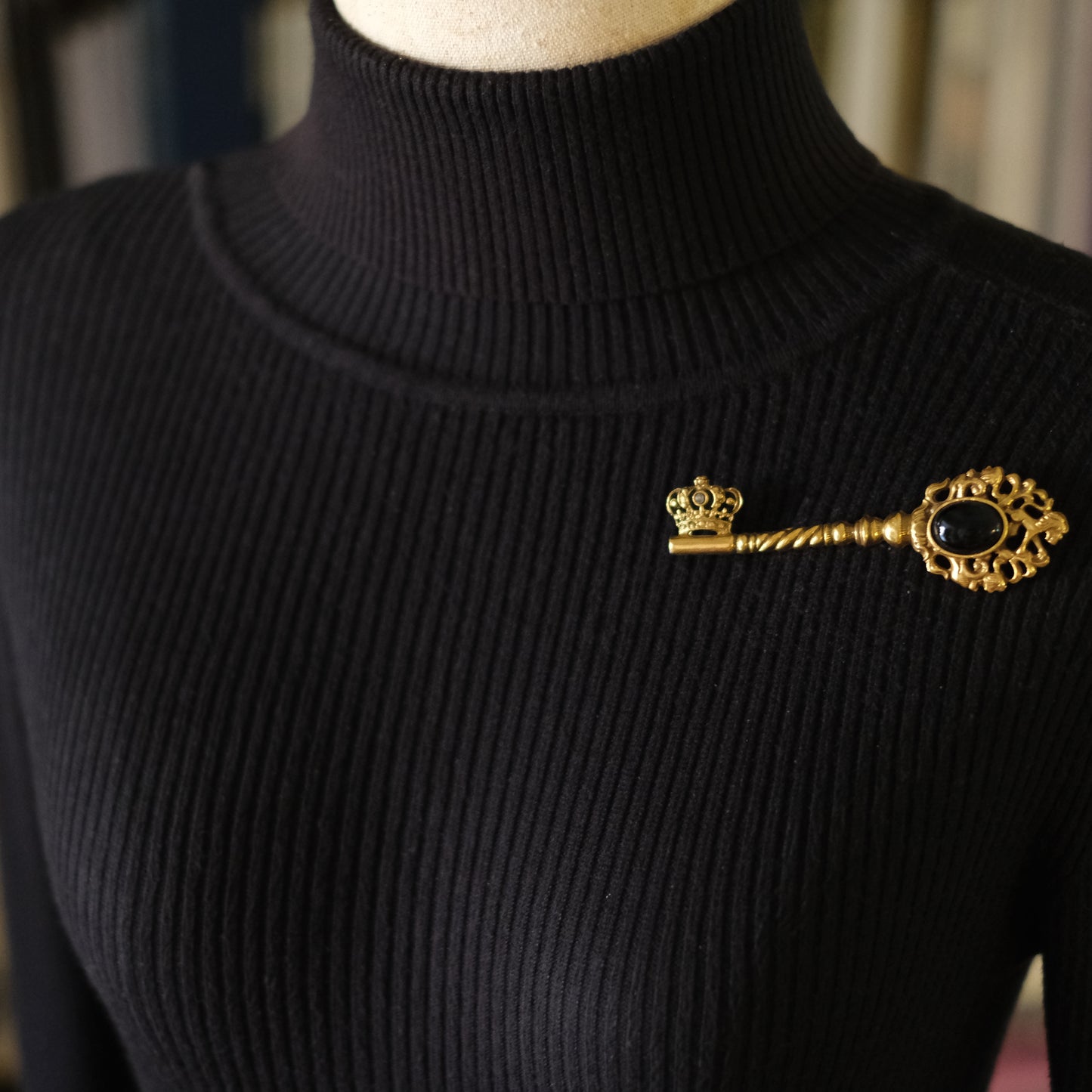 Vintage Gold-Tone Key Brooch with Black Cabochon and Crown Detail
