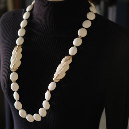 Vintage Trifari White Lucite Station Necklace with Sculptural Gold-Tone Accents