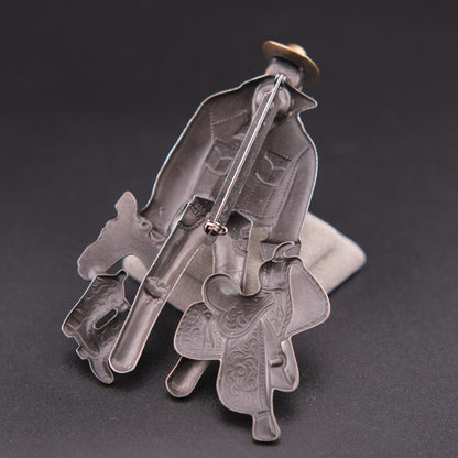 Vintage Cowboy Figural Brooch – Gun & Boots Western Motif with Rhinestone Face, Oxidized Silver & Copper Tone