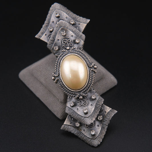 Vintage Sculptural Bow Brooch in Oxidized Silver Tone with Oval Ivory Cabochon and Rhinestone Accents, Signed
