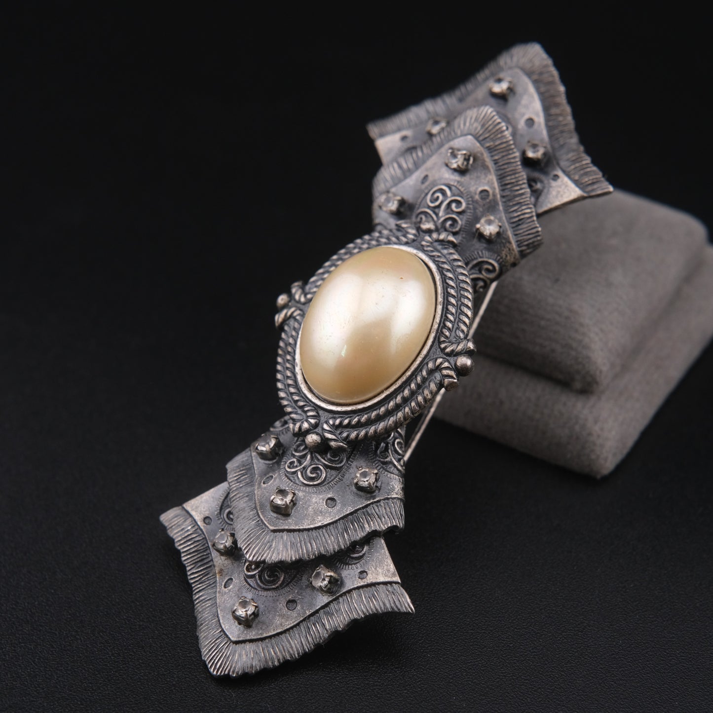 Vintage Sculptural Bow Brooch in Oxidized Silver Tone with Oval Ivory Cabochon and Rhinestone Accents, Signed