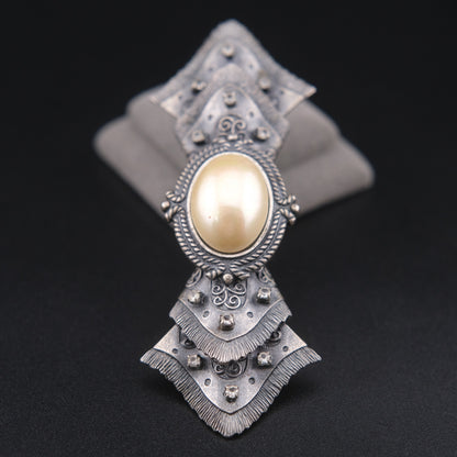Vintage Sculptural Bow Brooch in Oxidized Silver Tone with Oval Ivory Cabochon and Rhinestone Accents, Signed