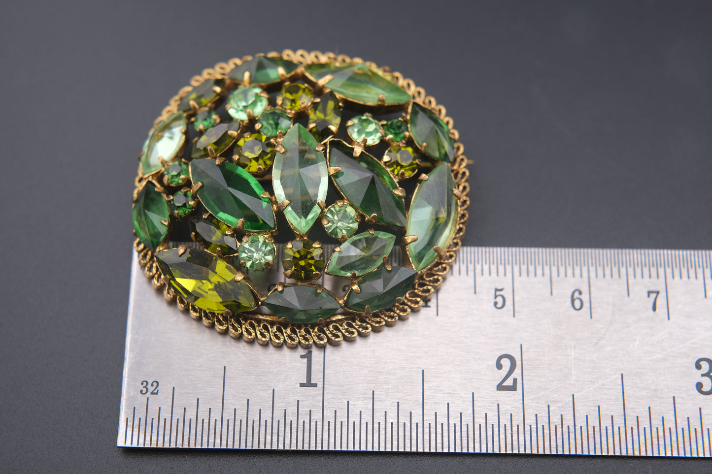 Austria Green Rhinestone Brooch – Gold-Tone Filigree with Navette & Round-Cut Stones