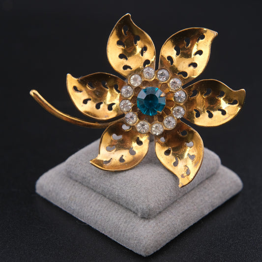 Vintage Coro Brass Flower Brooch with Teal Blue Rhinestone Center