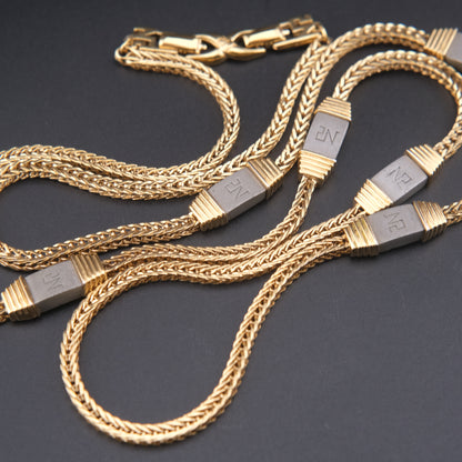 Vintage Nina Ricci Station Necklace – Gold-Tone with Brushed Metal Accents