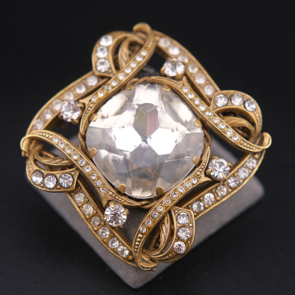 ❤️ Vintage Gold-Tone Rhinestone Brooch with Large Faceted Crystal Center, Sculptural Ribbon Design