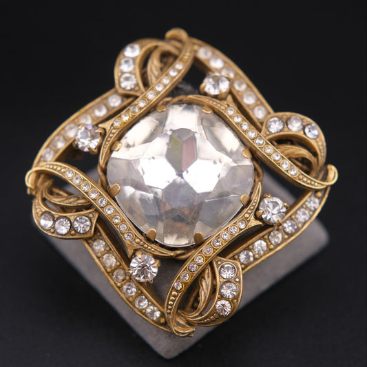 ❤️ Vintage Gold-Tone Rhinestone Brooch with Large Faceted Crystal Center, Sculptural Ribbon Design