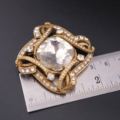 ❤️ Vintage Gold-Tone Rhinestone Brooch with Large Faceted Crystal Center, Sculptural Ribbon Design