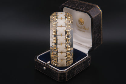 Clear Resin Cuff Bracelet with Gold-Tone Chain and White Inlay – Bold Sculptural Statement