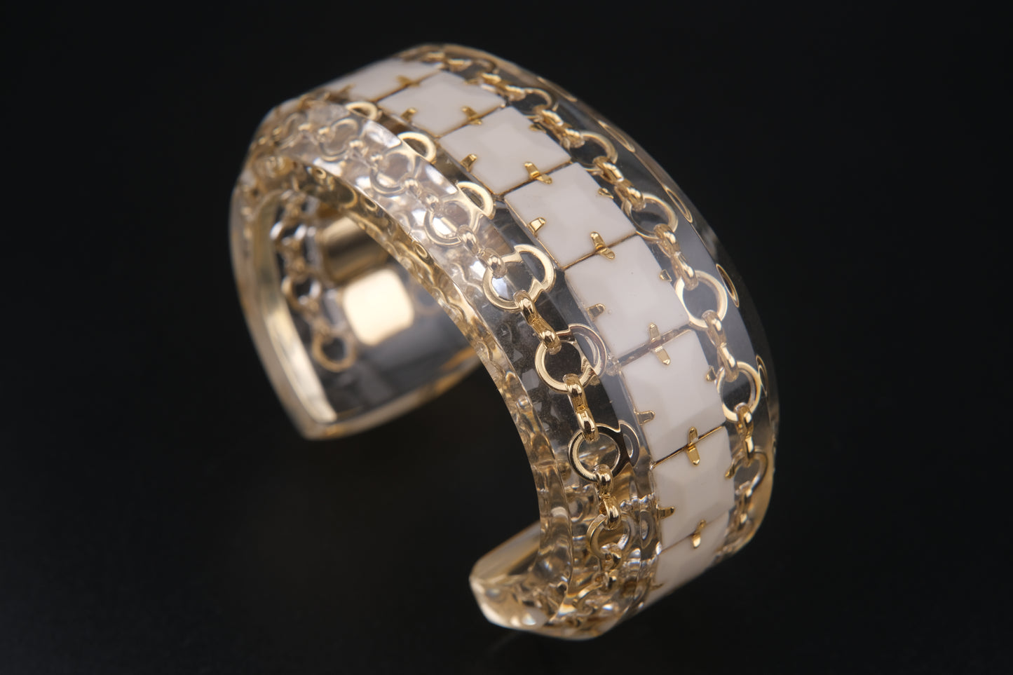 Clear Resin Cuff Bracelet with Gold-Tone Chain and White Inlay – Bold Sculptural Statement