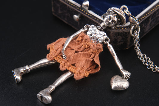 Servane Gaxotte Paris Articulated Doll Pendant Necklace – Silver-Tone with Orange Fabric Dress & Heart Charm