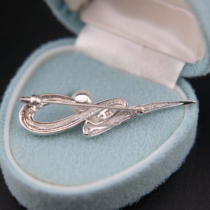 Tasaki Akoya Pearl Brooch – Sculptural Silver Ribbon Design