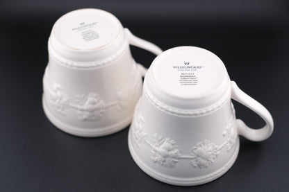 Wedgwood Festivity Raspberry Queen’s Ware Mug Pair – White Embossed Relief with Raspberry Interior Motif