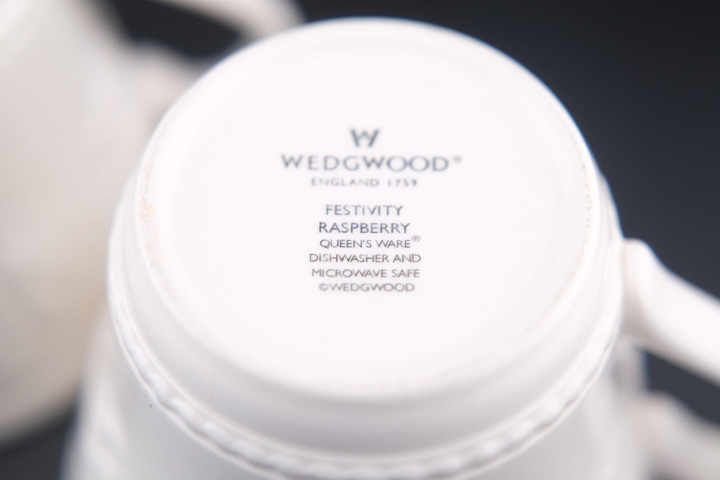 Wedgwood Festivity Raspberry Queen’s Ware Mug Pair – White Embossed Relief with Raspberry Interior Motif
