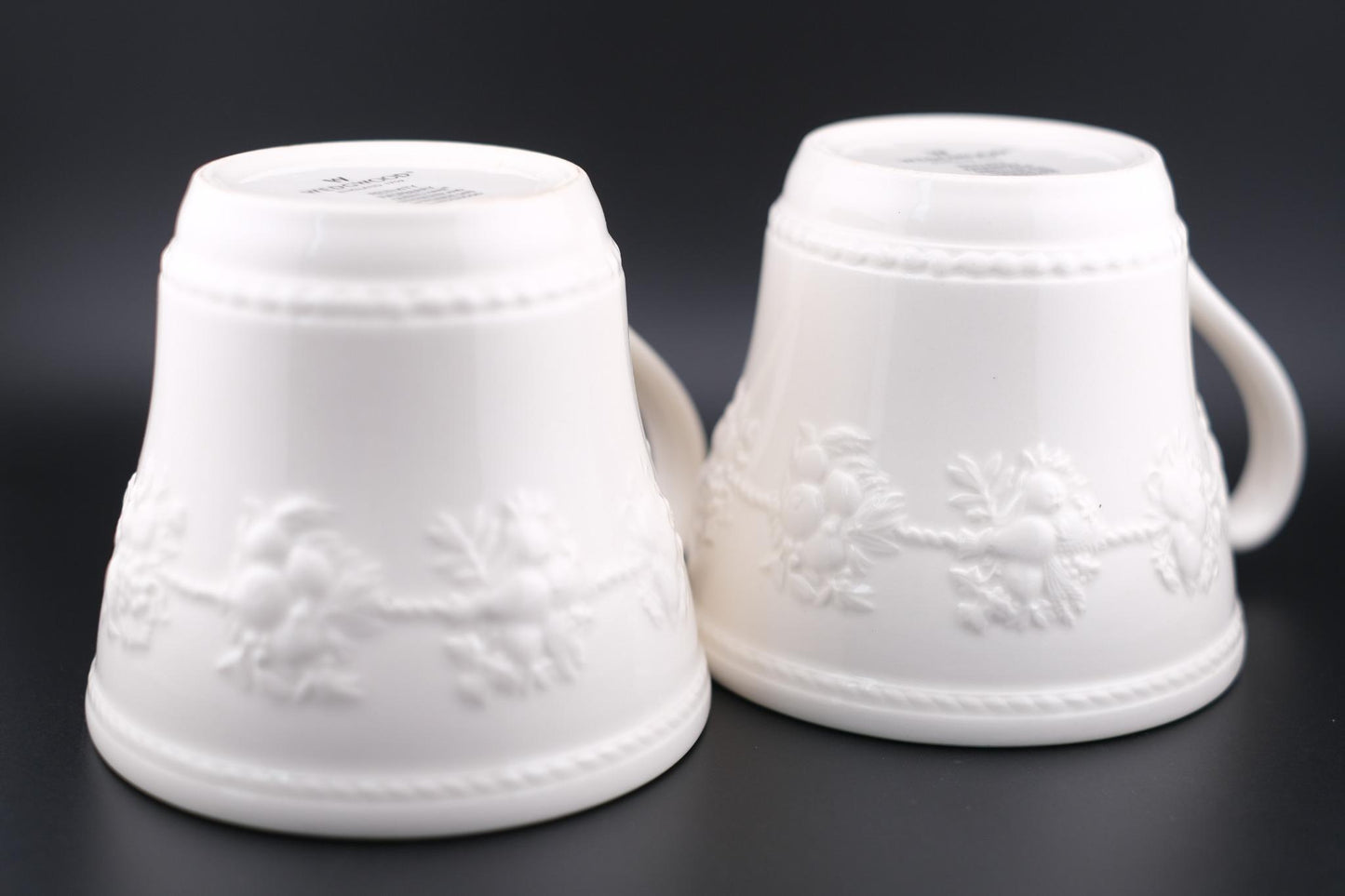 Wedgwood Festivity Raspberry Queen’s Ware Mug Pair – White Embossed Relief with Raspberry Interior Motif