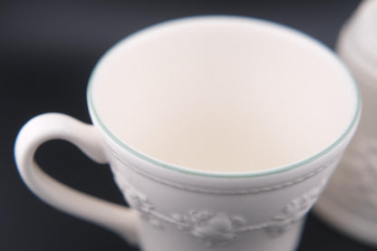 Wedgwood Festivity Raspberry Queen’s Ware Mug Pair – White Embossed Relief with Raspberry Interior Motif