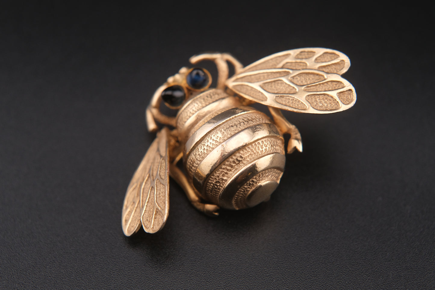 Vintage Wiggle-Wing Bee Brooch – Gold Tone Metal with Black Cabochon Eyes | 1950s–1960s Statement Pin