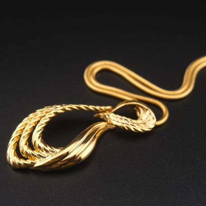 Vintage Gianni Valentino Gold-Tone Pendant Necklace – Sculptural Knot Design