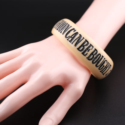 ❤️ Jessica Kagan Cushman Resin Quote Bangle “Fashion can be bought, style one must possess.”