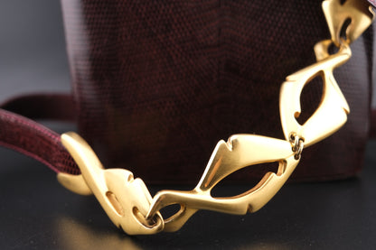 👜 Vintage Gucci Lizard Crossbody Bag with Sculptural Strap Accents