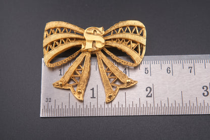Vintage Sonia Rykiel Gold-Tone Filigree Bow Brooch with SR Monogram