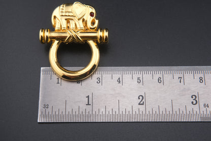 Vintage Malka Paris Elephant Pin – Gilded Gold-Tone with Red Crystal Eye, Made in France