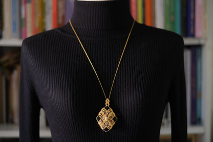 Vintage Gold Filigree Loupe Pendant Necklace with Black Accents and Hidden Magnifier