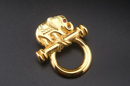 Vintage Malka Paris Elephant Pin – Gilded Gold-Tone with Red Crystal Eye, Made in France