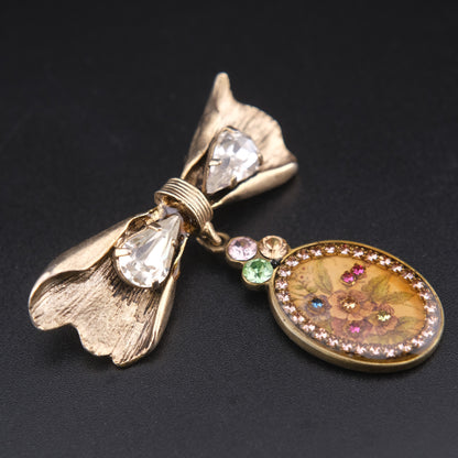 Vintage Michal Negrin Bow & Floral Drop Brooch – Crystal Accents, Romantic Design
