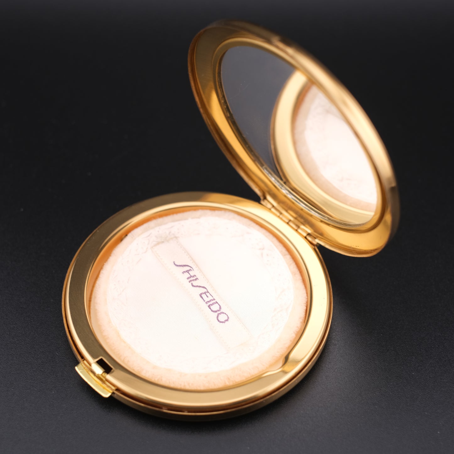 Vintage Shiseido Powder Compact – Black & Gold Art Deco Design