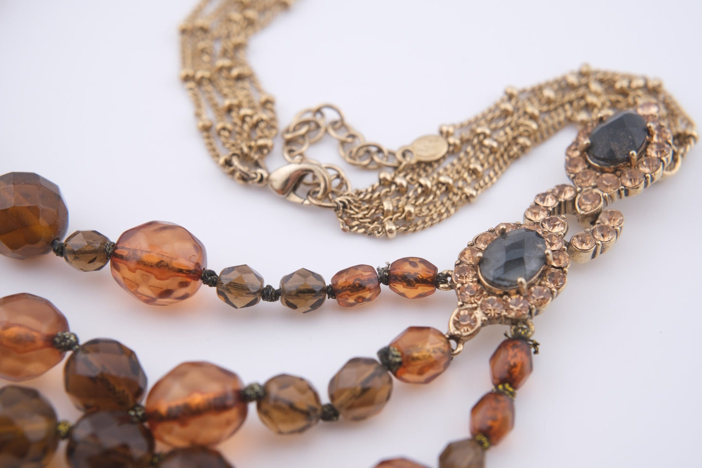 Vintage Monet Triple Strand Beaded Necklace – Faceted Amber & Smoky Brown with Rhinestone Accents