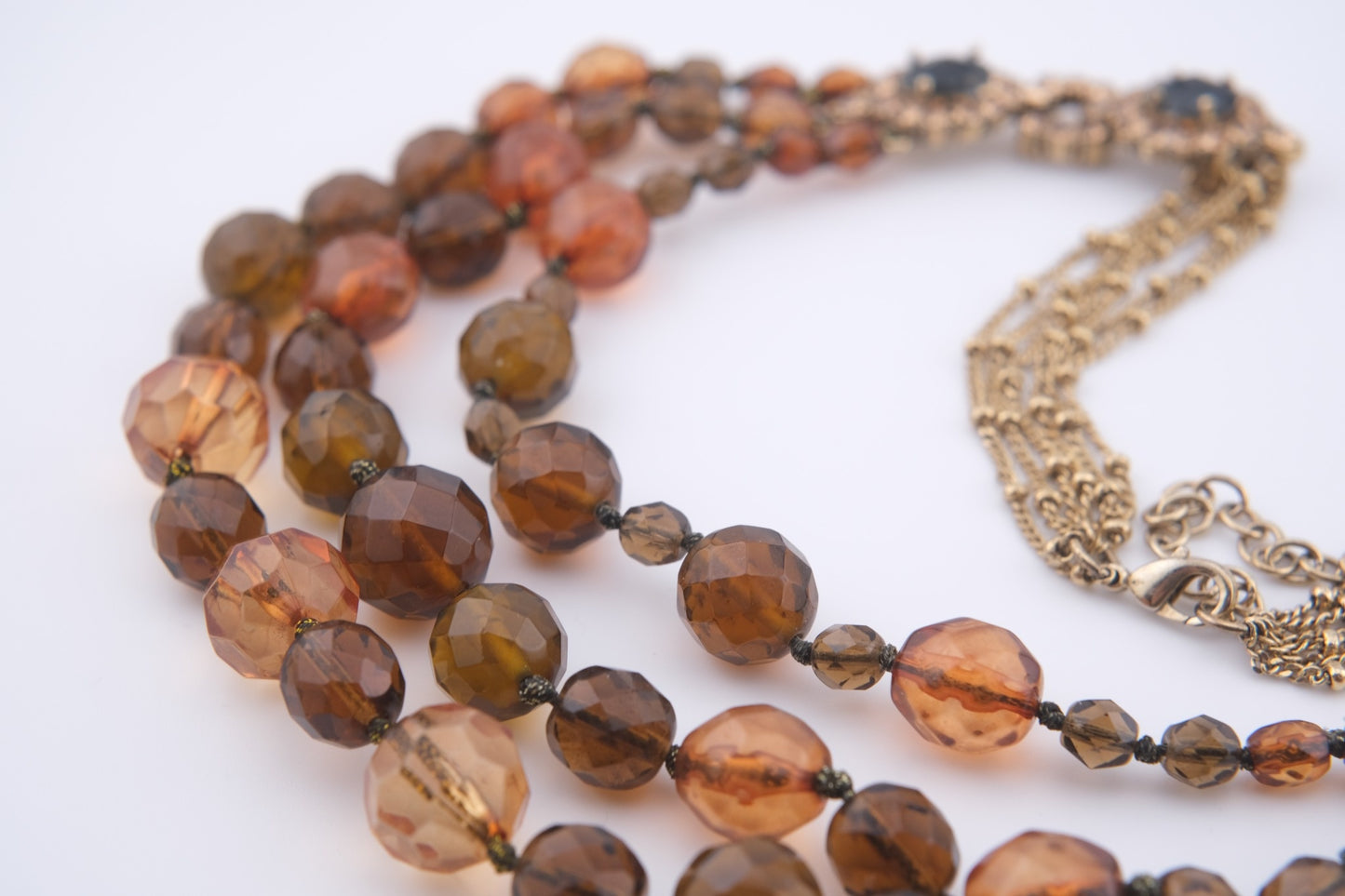 Vintage Monet Triple Strand Beaded Necklace – Faceted Amber & Smoky Brown with Rhinestone Accents