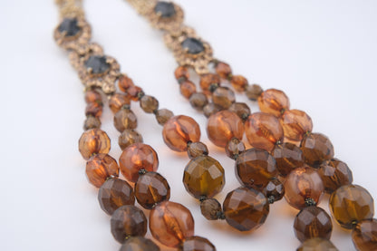 Vintage Monet Triple Strand Beaded Necklace – Faceted Amber & Smoky Brown with Rhinestone Accents